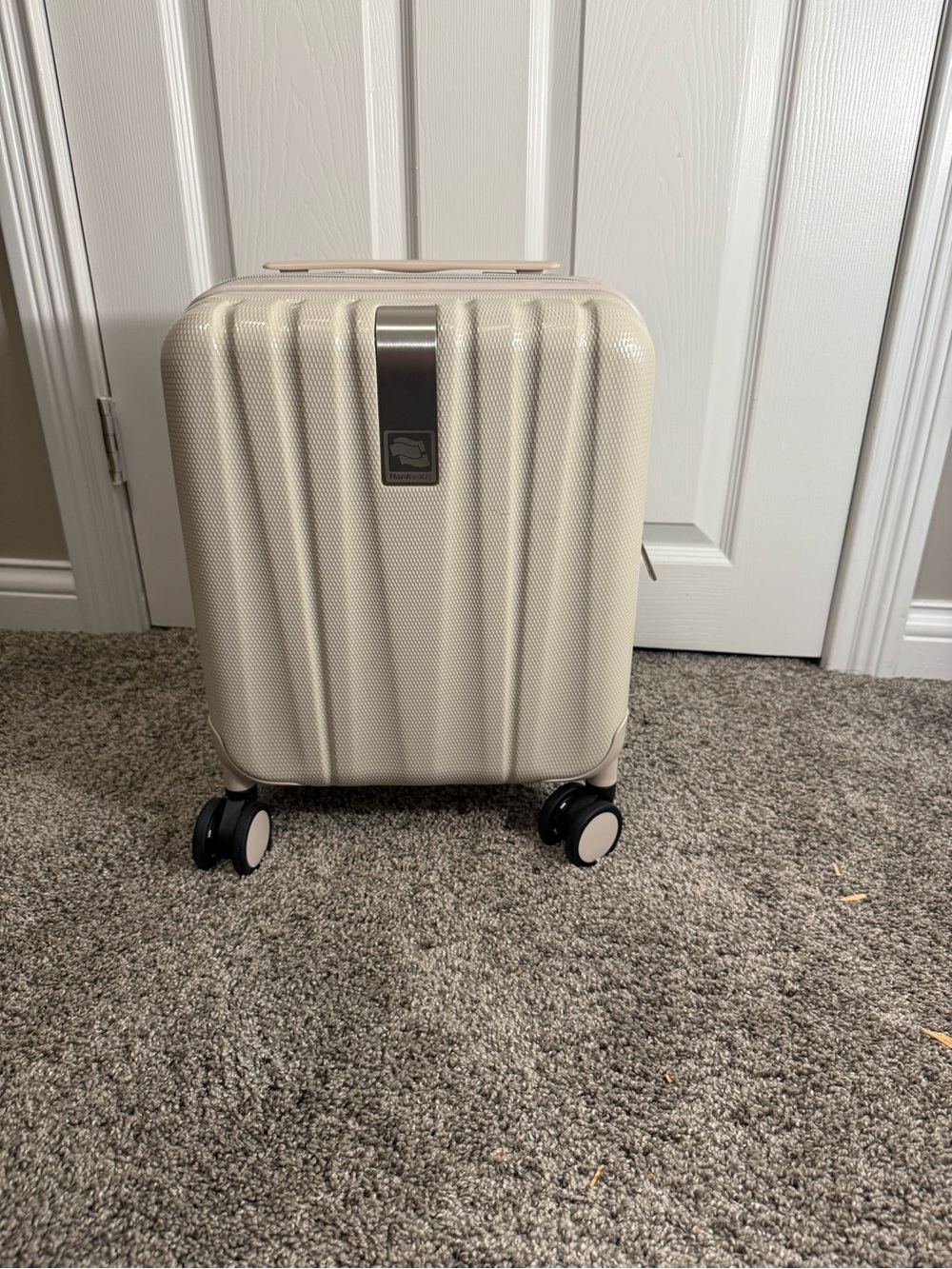 Compact Cream Hardshell Carry-On Spinner